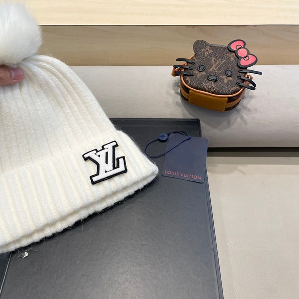 BERRETTO IN MAGLIA DI LANA BIANCA 413368