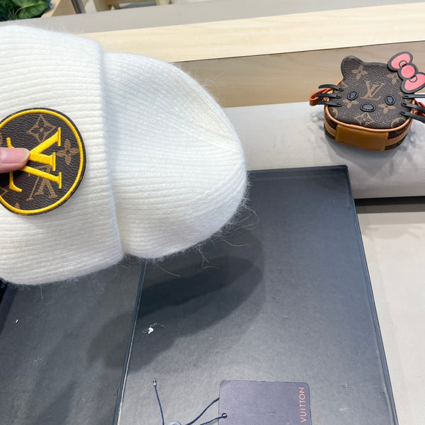 BERRETTO IN MAGLIA DI LANA BIANCA E PELLICCIA DI CONIGLIO 417753