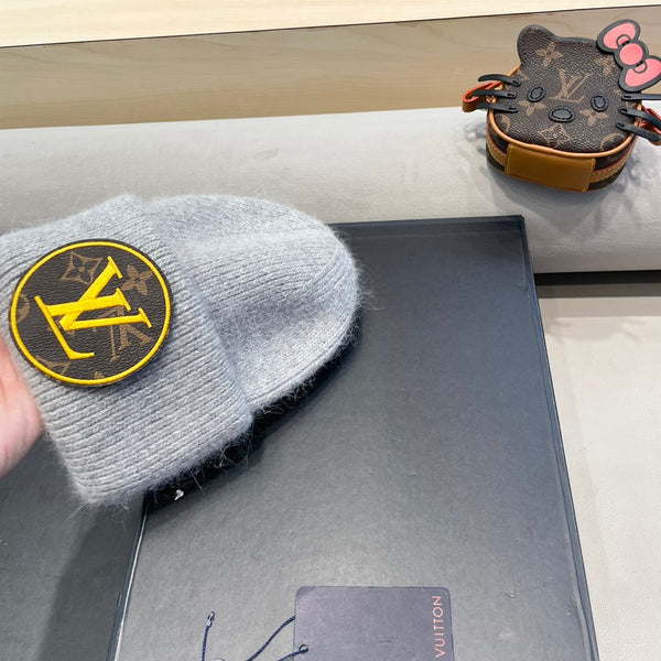 BERRETTO IN MAGLIA DI LANA GRIGIO CHIARO E PELLICCIA DI CONIGLIO 417755