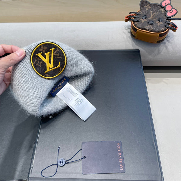 BERRETTO IN MAGLIA DI LANA GRIGIO CHIARO E PELLICCIA DI CONIGLIO 417755