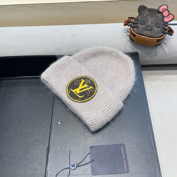 KNITTED BEANIE HAT IN LIGHT BEIGE WOOL AND RABBIT FUR 417756