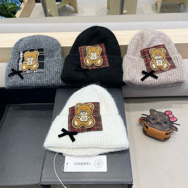 BERRETTO IN LANA GRIGIO SQUALO CON FIOCCO 421252