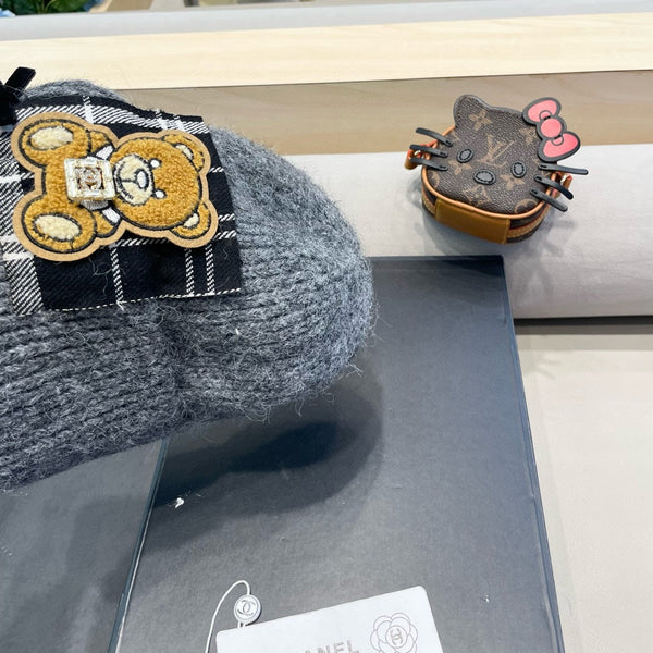 BERRETTO IN LANA GRIGIO SQUALO CON FIOCCO 421252