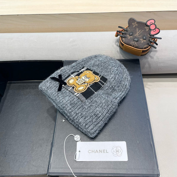 BERRETTO IN LANA GRIGIO SQUALO CON FIOCCO 421252