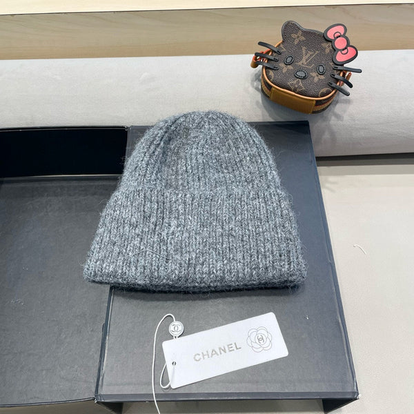 BERRETTO IN LANA GRIGIO SQUALO CON FIOCCO 421252