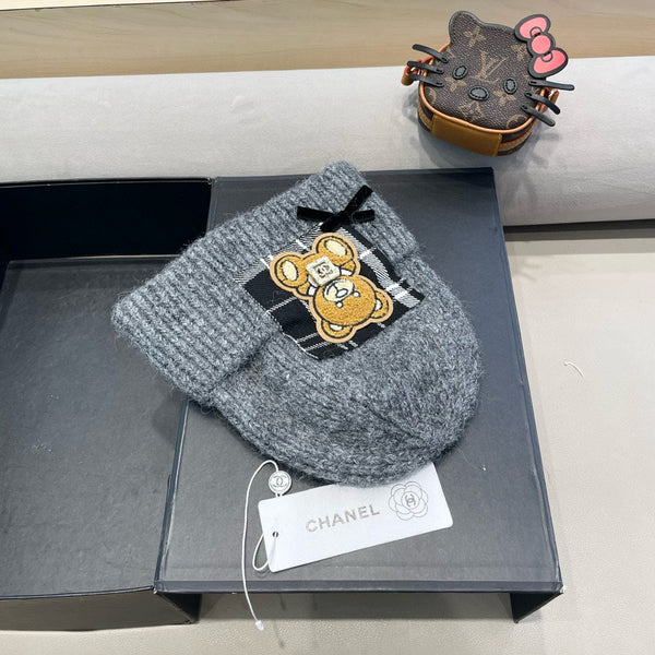 BERRETTO IN LANA GRIGIO SQUALO CON FIOCCO 421252