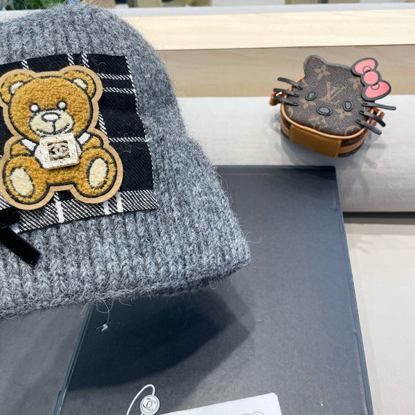 BERRETTO IN LANA GRIGIO SQUALO CON FIOCCO 421252