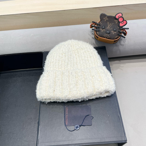 BERRETTO IN MAGLIA DI LANA BIANCA 421265