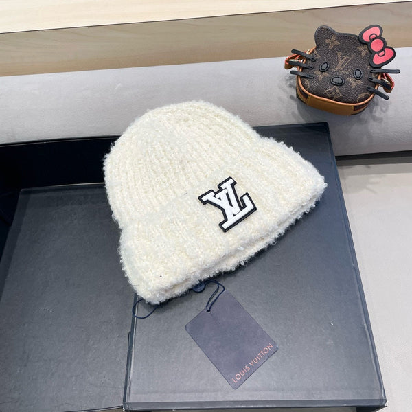 BERRETTO IN MAGLIA DI LANA BIANCA 421265