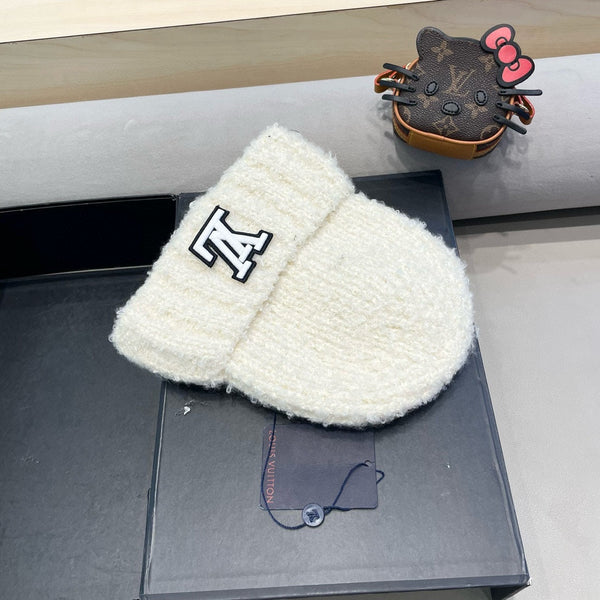 BERRETTO IN MAGLIA DI LANA BIANCA 421265