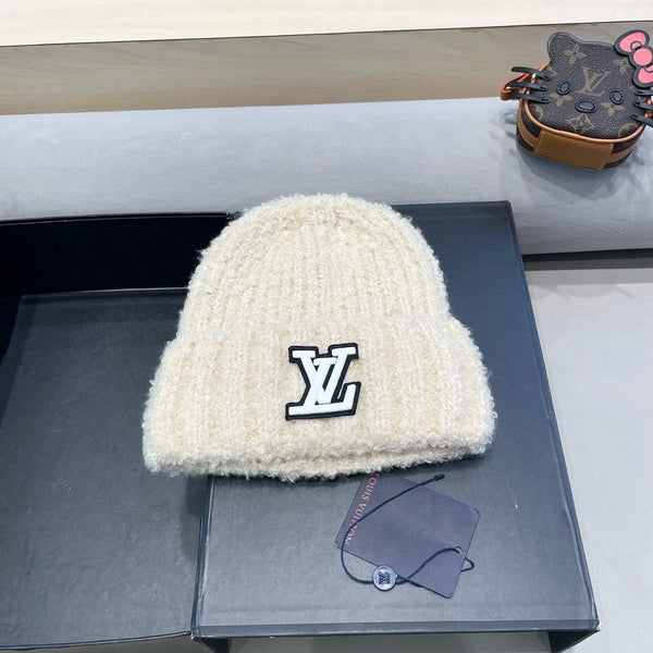 BERRETTO IN MAGLIA DI LANA BEIGE CHIARO 421267