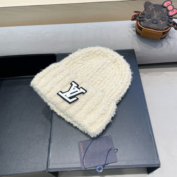 BERRETTO IN MAGLIA DI LANA BEIGE CHIARO 421267