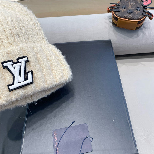 BERRETTO IN MAGLIA DI LANA BEIGE CHIARO 421267