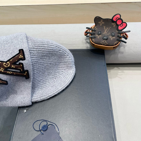 BERRETTO IN MAGLIA IN PILE E LANA GRIGIA 426206