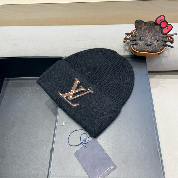 BERRETTO IN MAGLIA IN PILE E LANA NERI 426208