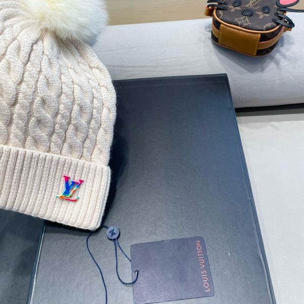 BERRETTO IN MAGLIA DI LANA BEIGE 426214