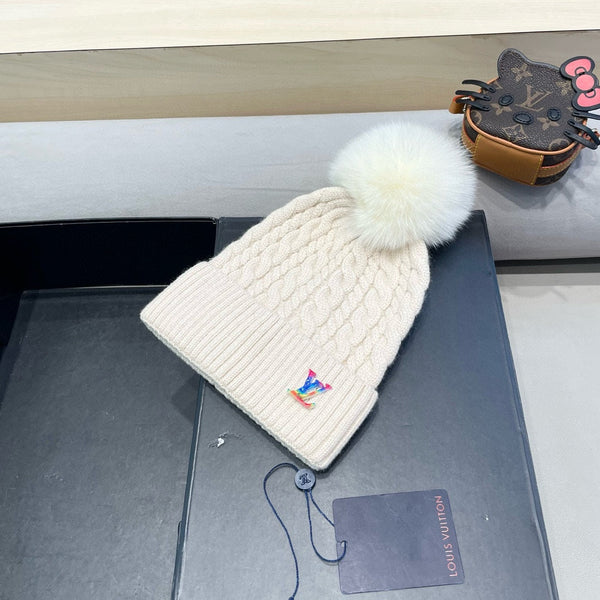 BERRETTO IN MAGLIA DI LANA BEIGE 426214