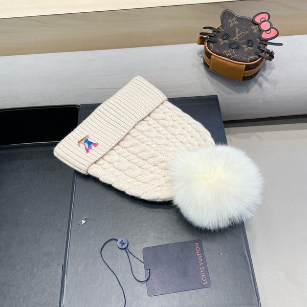 BERRETTO IN MAGLIA DI LANA BEIGE 426214