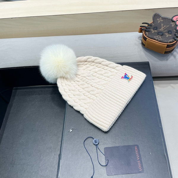 BERRETTO IN MAGLIA DI LANA BEIGE 426214