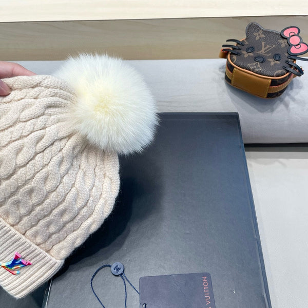 BERRETTO IN MAGLIA DI LANA BEIGE 426214