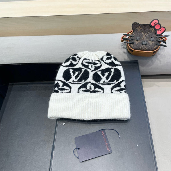 BERRETTO IN MAGLIA IN LANA MISTO BIANCO NERO E PELLICCIA DI CONIGLIO 426243