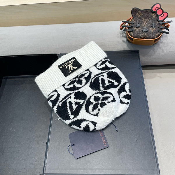 BERRETTO IN MAGLIA IN LANA MISTO BIANCO NERO E PELLICCIA DI CONIGLIO 426243