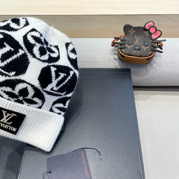 BERRETTO IN MAGLIA IN LANA MISTO BIANCO NERO E PELLICCIA DI CONIGLIO 426243