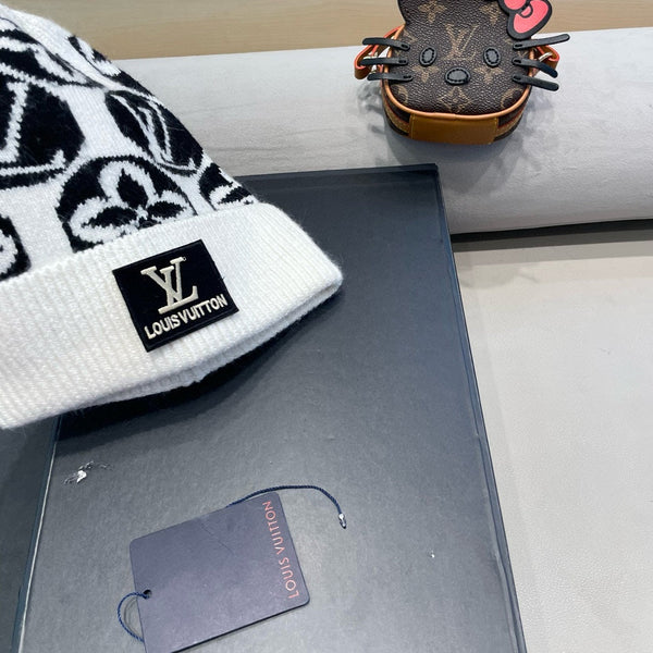 BERRETTO IN MAGLIA IN LANA MISTO BIANCO NERO E PELLICCIA DI CONIGLIO 426243