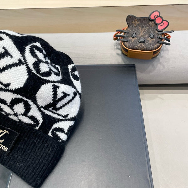 BERRETTO IN MAGLIA IN LANA MISTA BIANCA E NERA E PELLICCIA DI CONIGLIO 426245