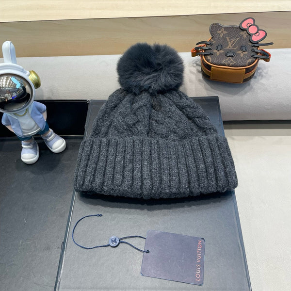 BERRETTO IN MAGLIA DI LANA NERA E PELLICCIA DI AGNELLO 430044