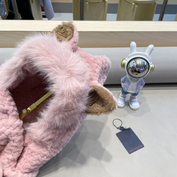 BERRETTO IN LANA ROSA PASTELLO E PELLICCIA DI AGNELLO 435072