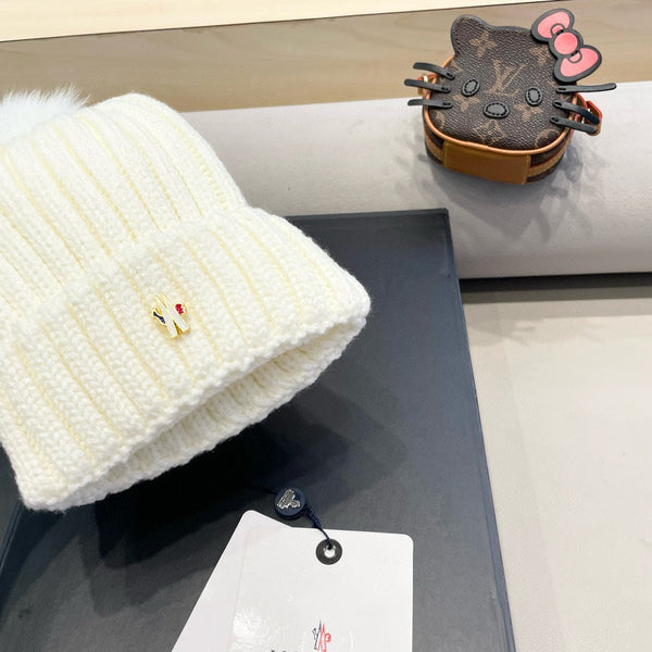 BERRETTO IN LANA CON POM POM BIANCO 435046