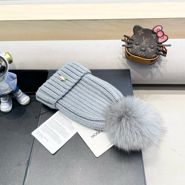 BERRETTO IN LANA CON POM POM GRIGIO CHIARO 435050