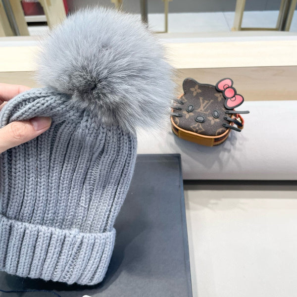 BERRETTO IN LANA CON POM POM GRIGIO CHIARO 435050