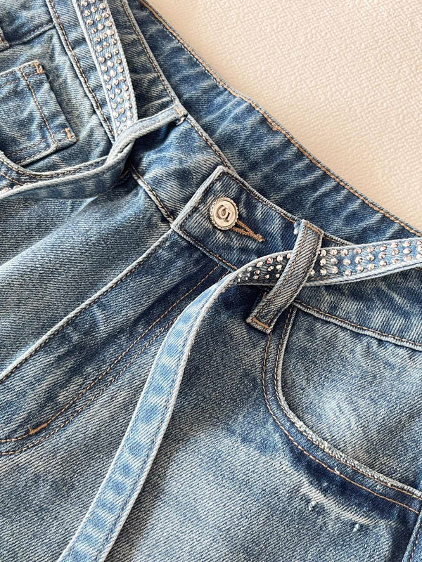 CC Jean large en denim bleu à ceinture en strass 351177