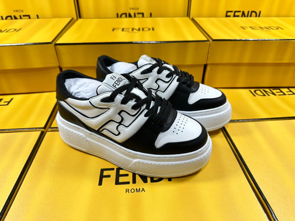 FENDI THICK-SOLDED SNEAKER IN WHITE AND BLACK LAMBSKIN