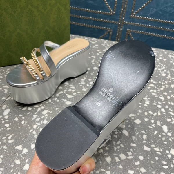 HIGH WEDGE PLATFORM IN SILVER CALFSKIN WITH GOLD HARDWARE