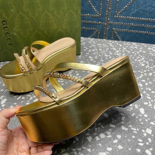 HIGH WEDGE PLATFORM IN GOLD CALFSKIN WITH GOLD HARDWARE