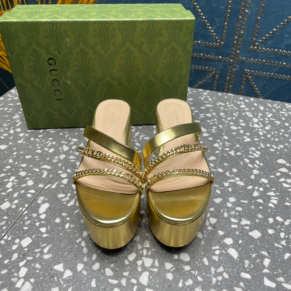 HIGH WEDGE PLATFORM IN GOLD CALFSKIN WITH GOLD HARDWARE