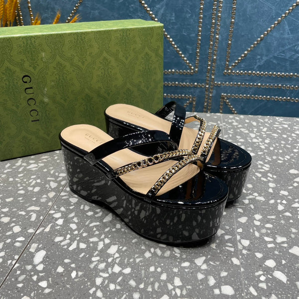 HIGH WEDGE PLATFORM IN BLACK CALFSKIN WITH GOLD HARDWARE