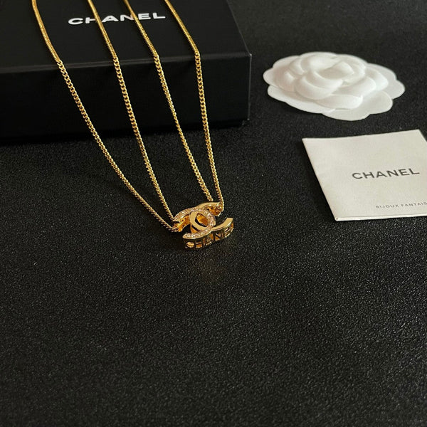 DOUBLE C HEART NECKLACE IN GOLD METAL