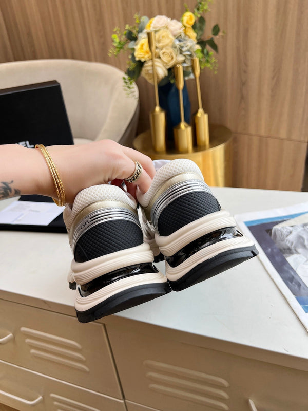 cc trainer nero oro vitello maglia bianca