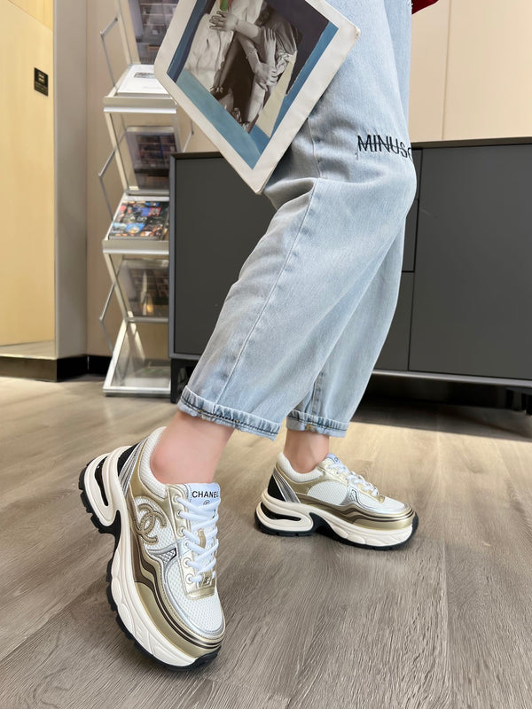 cc trainer nero oro vitello maglia bianca