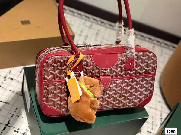 SAINT MARTIN BAG 35 IN BURGUNDY RED GOYARDINE CANVAS AND CALFSKIN