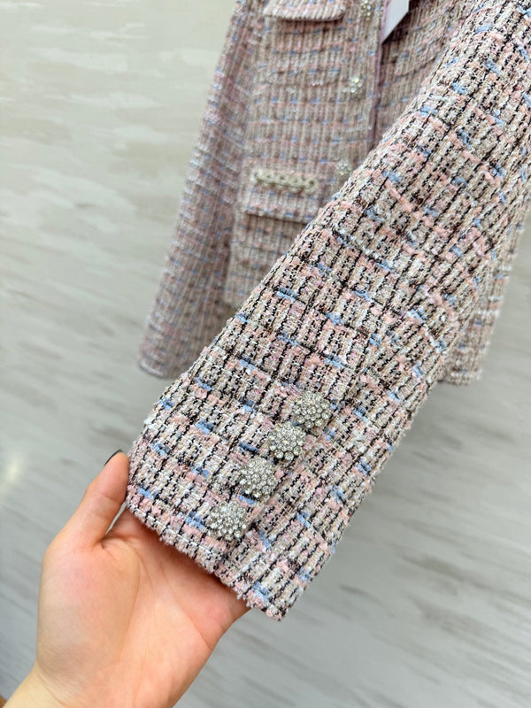 Veste Chanel 2025 à chaîne strassée en tweed rose 319510