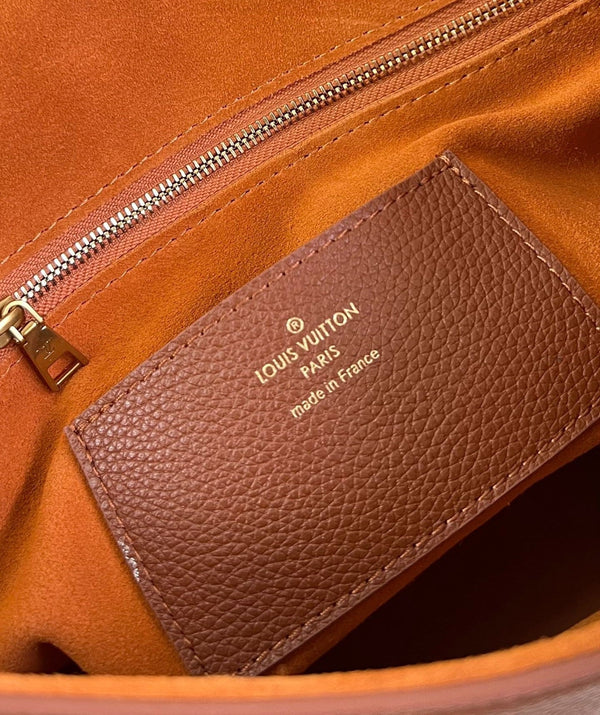 lv soft twist 27cm cognac calfskin gold hardware