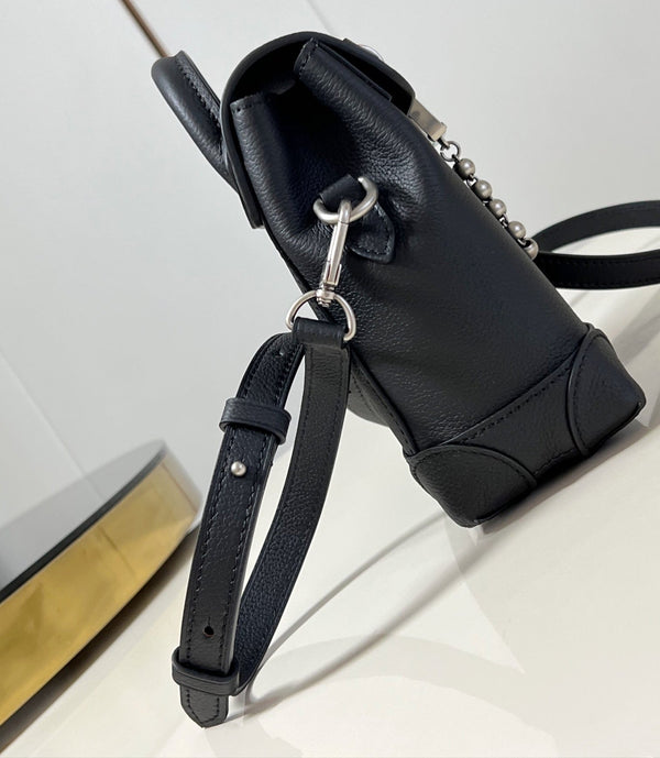 Steamer 20 in pelle di vitello nera con accessori in argento