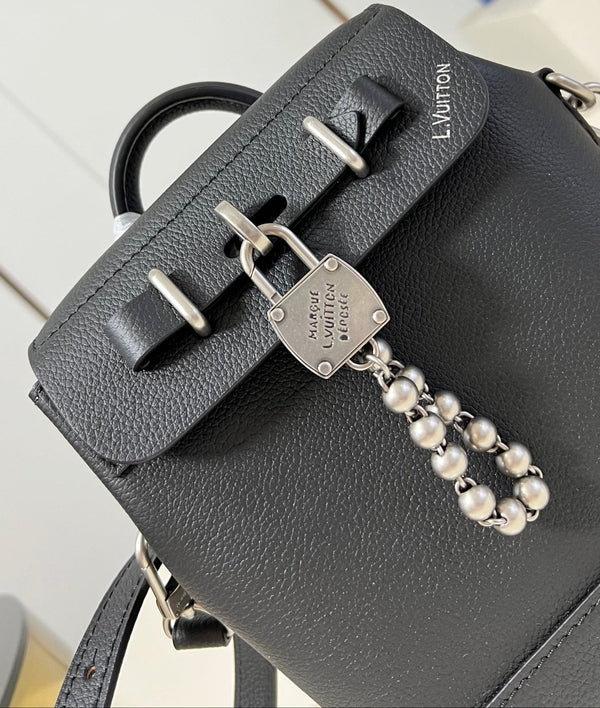 Steamer 20 in pelle di vitello nera con accessori in argento