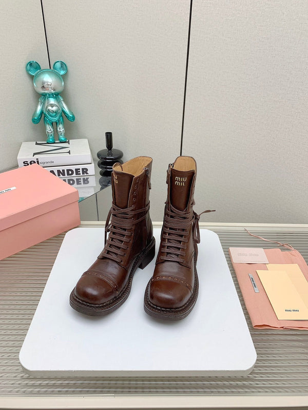 Stivaletti Miu in pelle con lacci in vacchetta marrone castagna