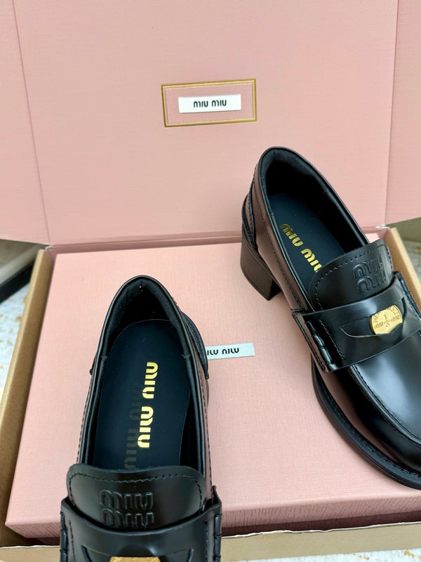 Miu Vintage-Effect Penny Loafers Black Leather 791004